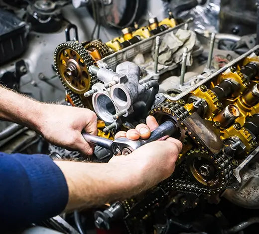 Hands-on expert technical support for performance engine fitment using professional tools.